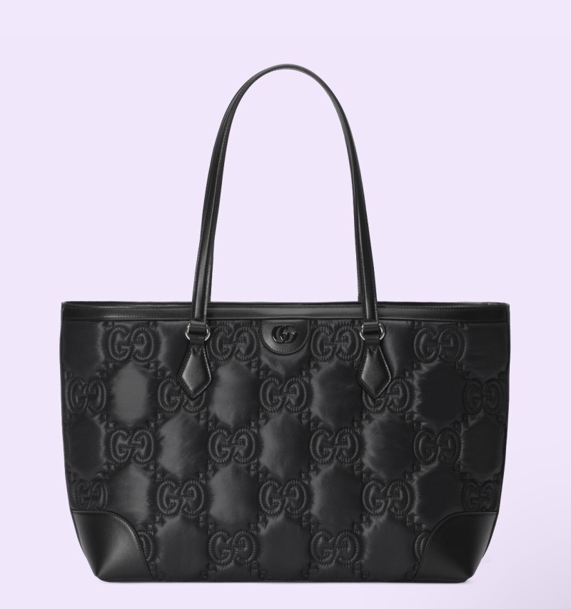 G*u*i shopping bags
